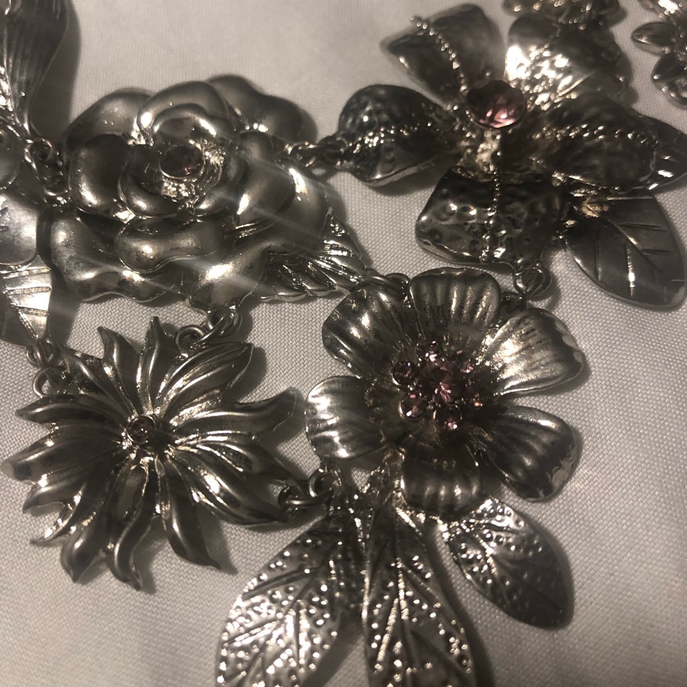 Silver flowered with purple stone necklace